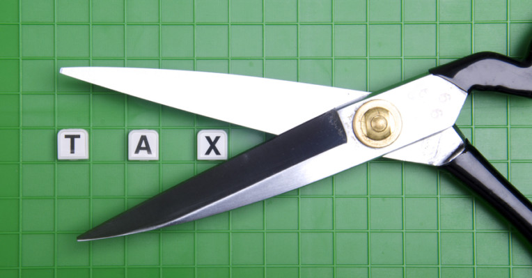 A Pair of scissors being put to tax