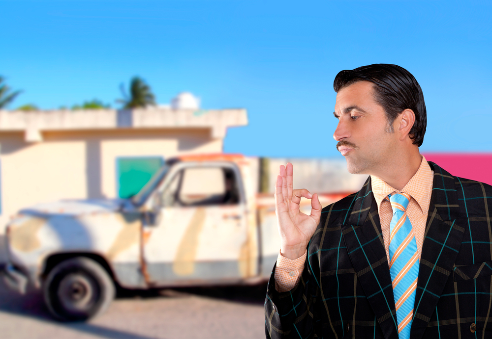 oily haired salesman