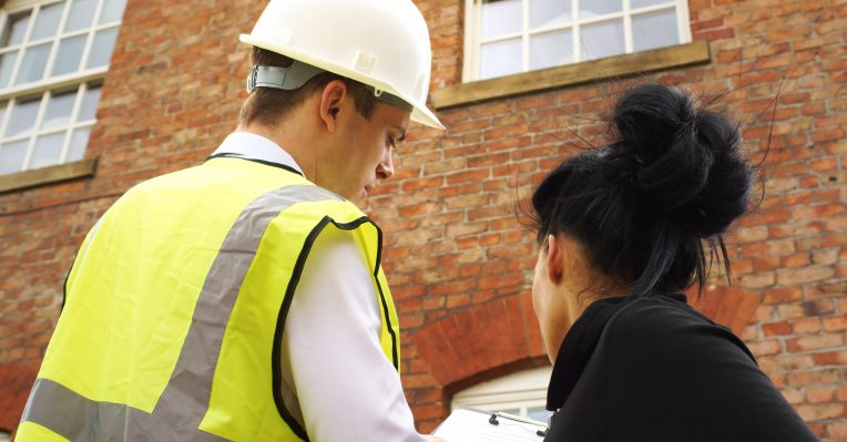 building surveyor showing report to client