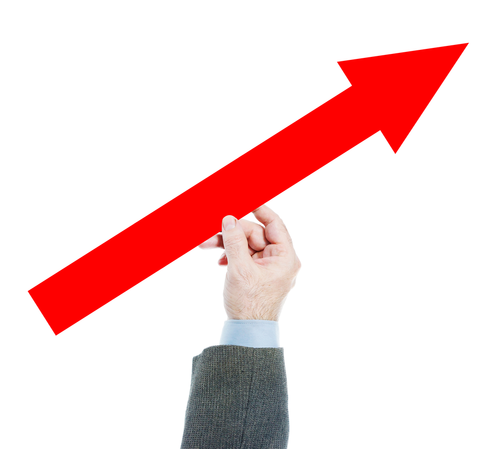 arrow driving upwards held against white background