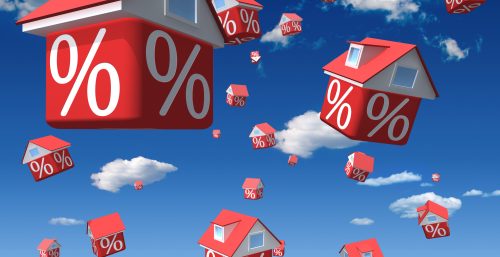 an image of floating houses with percentage signs to denote a story about mortgage rates