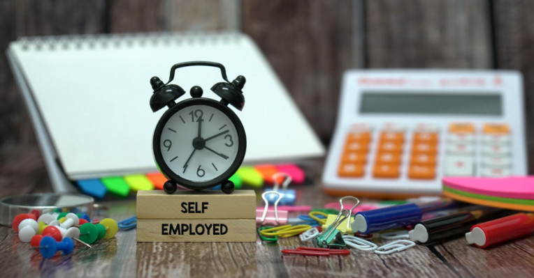 an image of an alarm clock on top of blocks that say 'self employed' to denote a story about self-employed mortgage choice