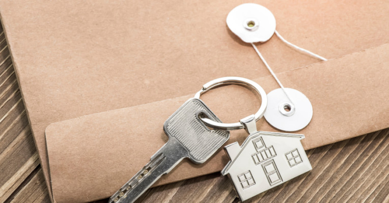 an image of keys on an envelope to denote a story about first-time landlords