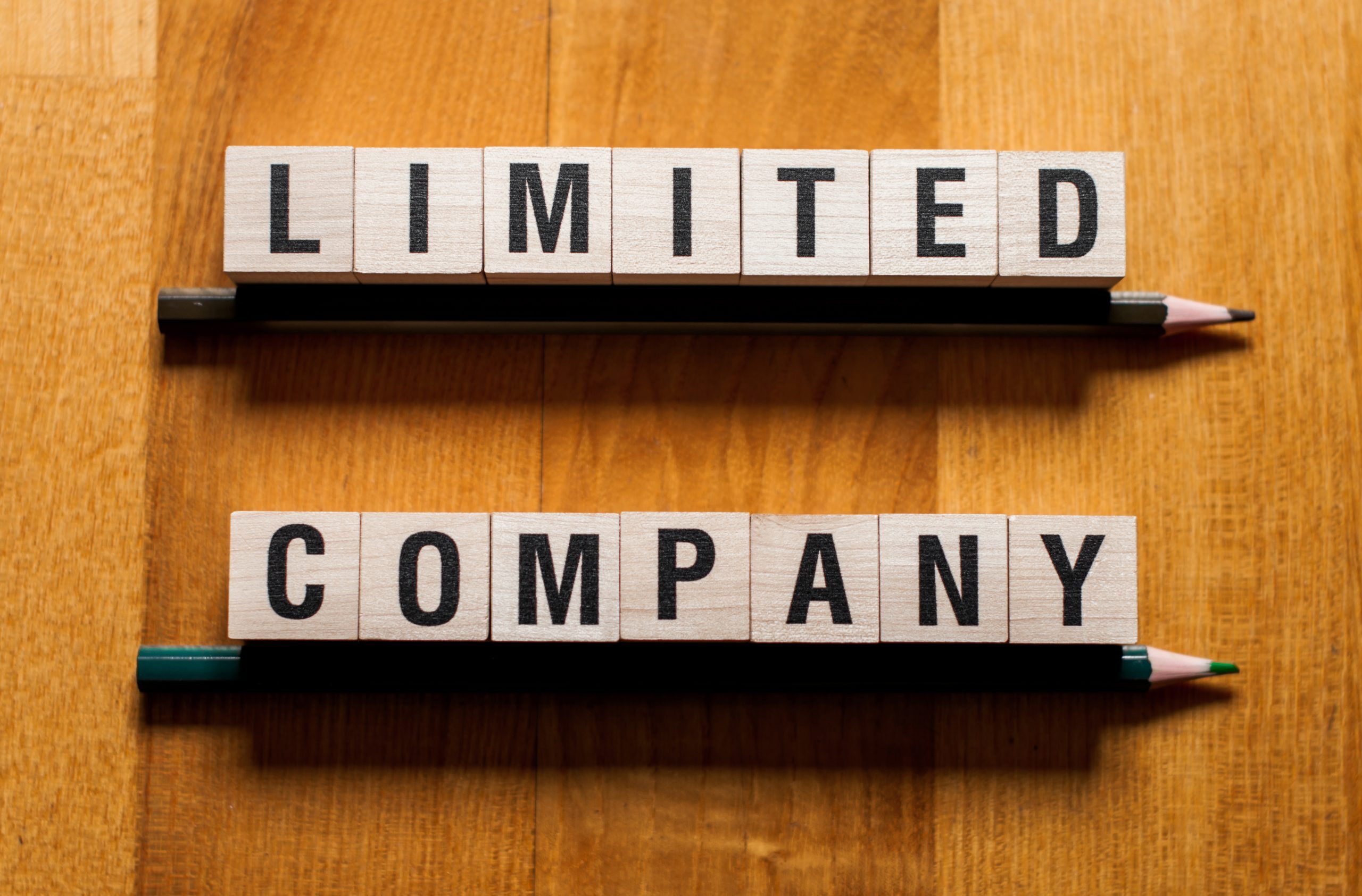 an image of blocks reading 'limited company' to denote landlords' plans to buy via limited company