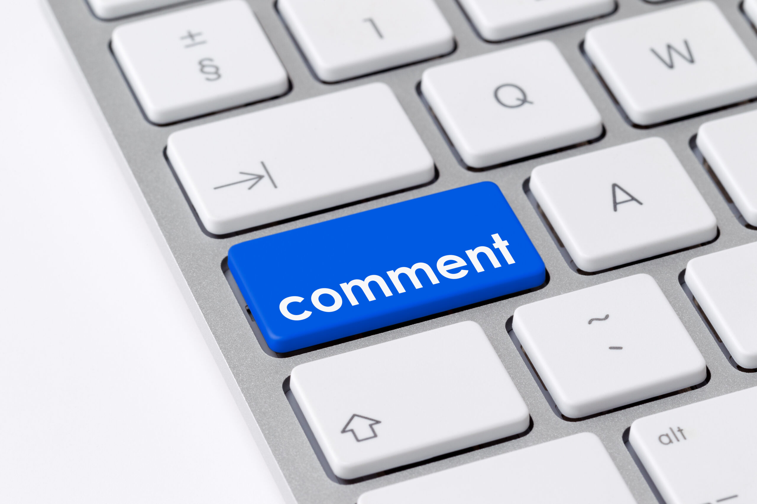 an image of a computer keyboard with a 'comment' key to denote a story about retirement