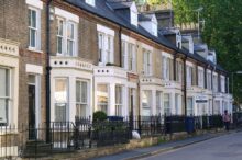 House price growth halves as 'reluctant' buyers and sellers hold back