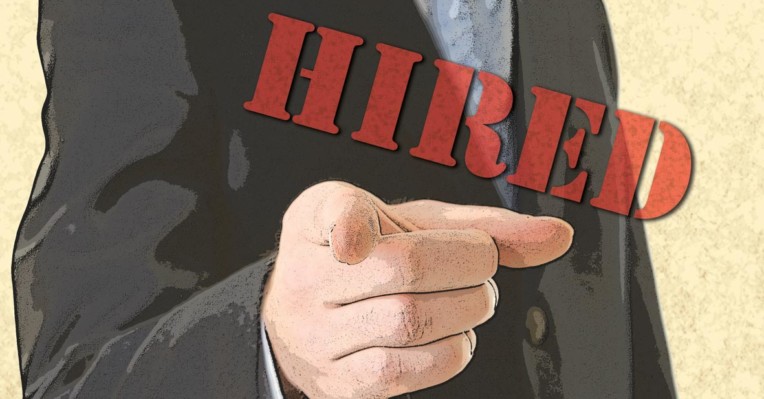 finger pointing with the word 'hired'