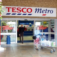 Suspended Tesco director returns to post